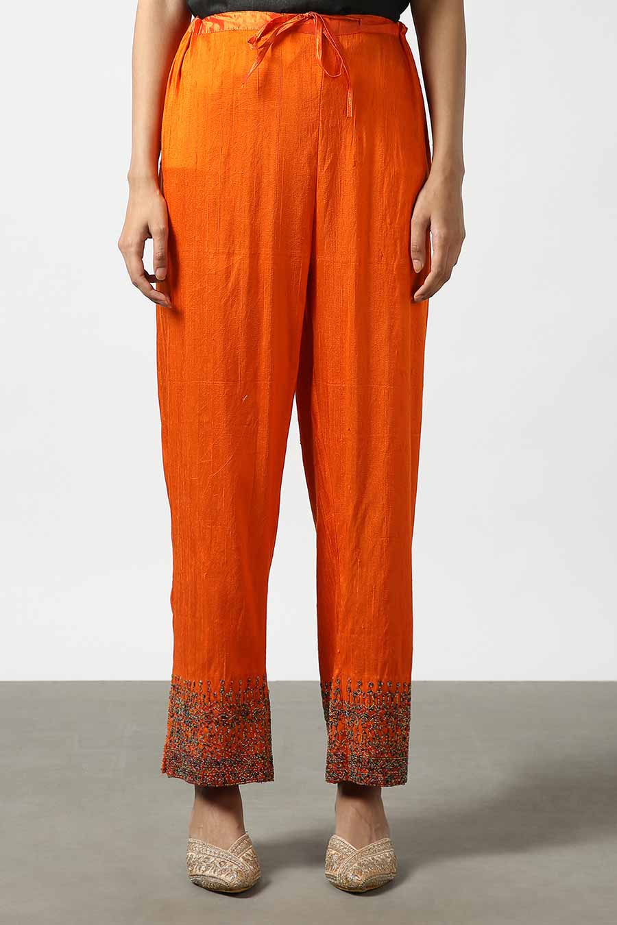 http://www.houseofdesigners.in/cdn/shop/files/LATHA_PUTTANNA_LATHA-LP22-LON-08_Orange_Silk_Embroidered_Pants_1.jpg?v=1686051887
