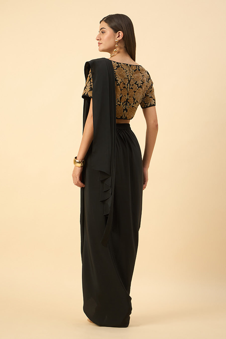 Black Pre-Draped Saree With Embellished Gold Blouse