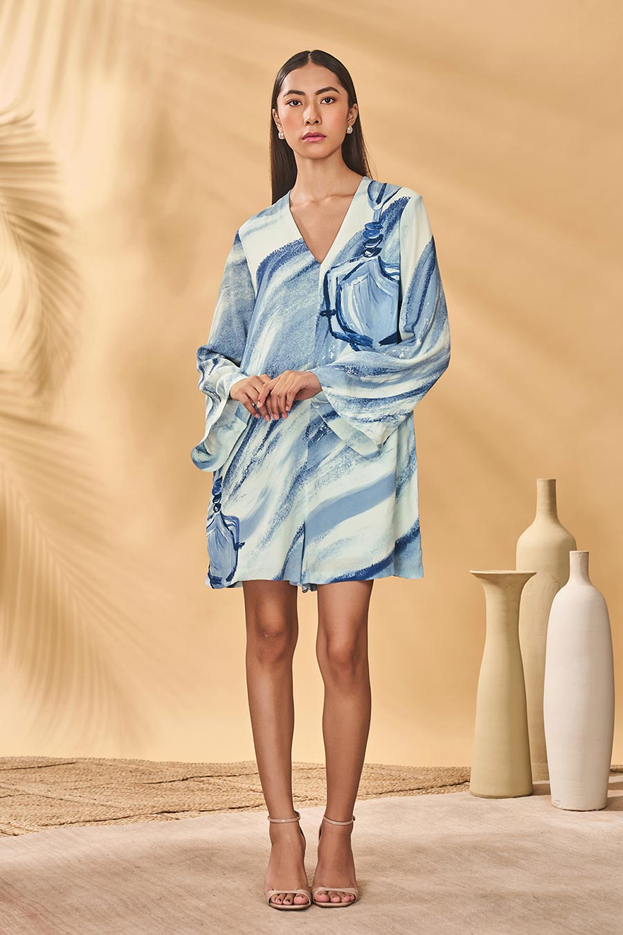 Rhythmic Curves Blue Printed Playsuit With Belt