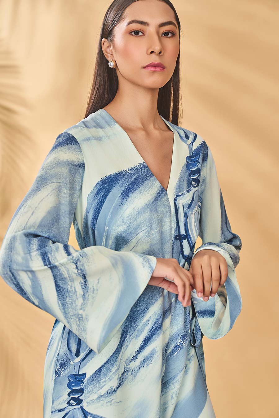 Rhythmic Curves Blue Printed Playsuit With Belt