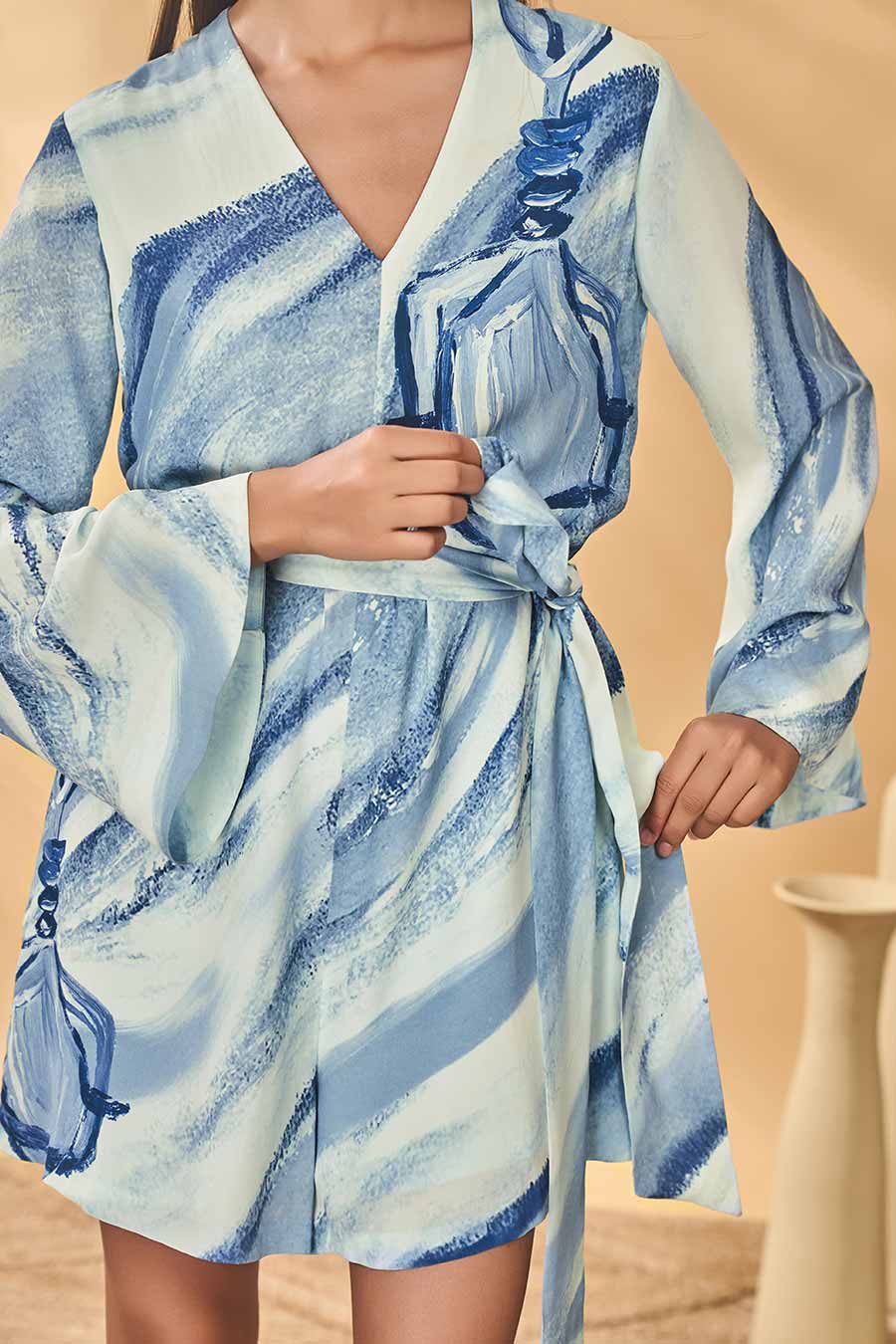 Rhythmic Curves Blue Printed Playsuit With Belt