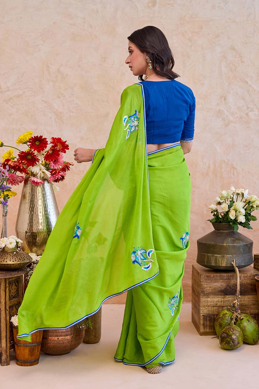 Parijata Green Embroidered Saree With Blue Blouse