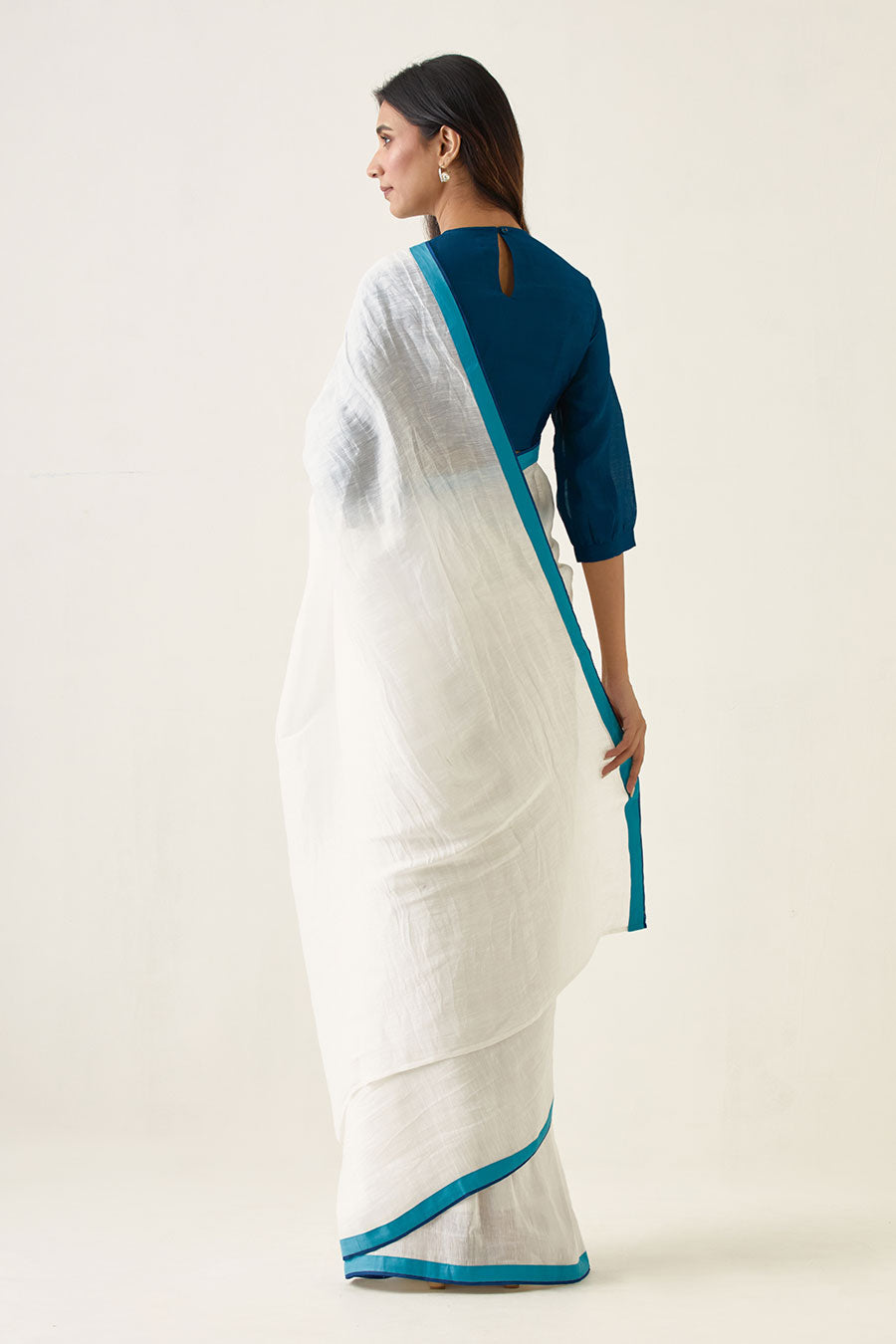 Handcrafted White Saree & Teal Blouse Set