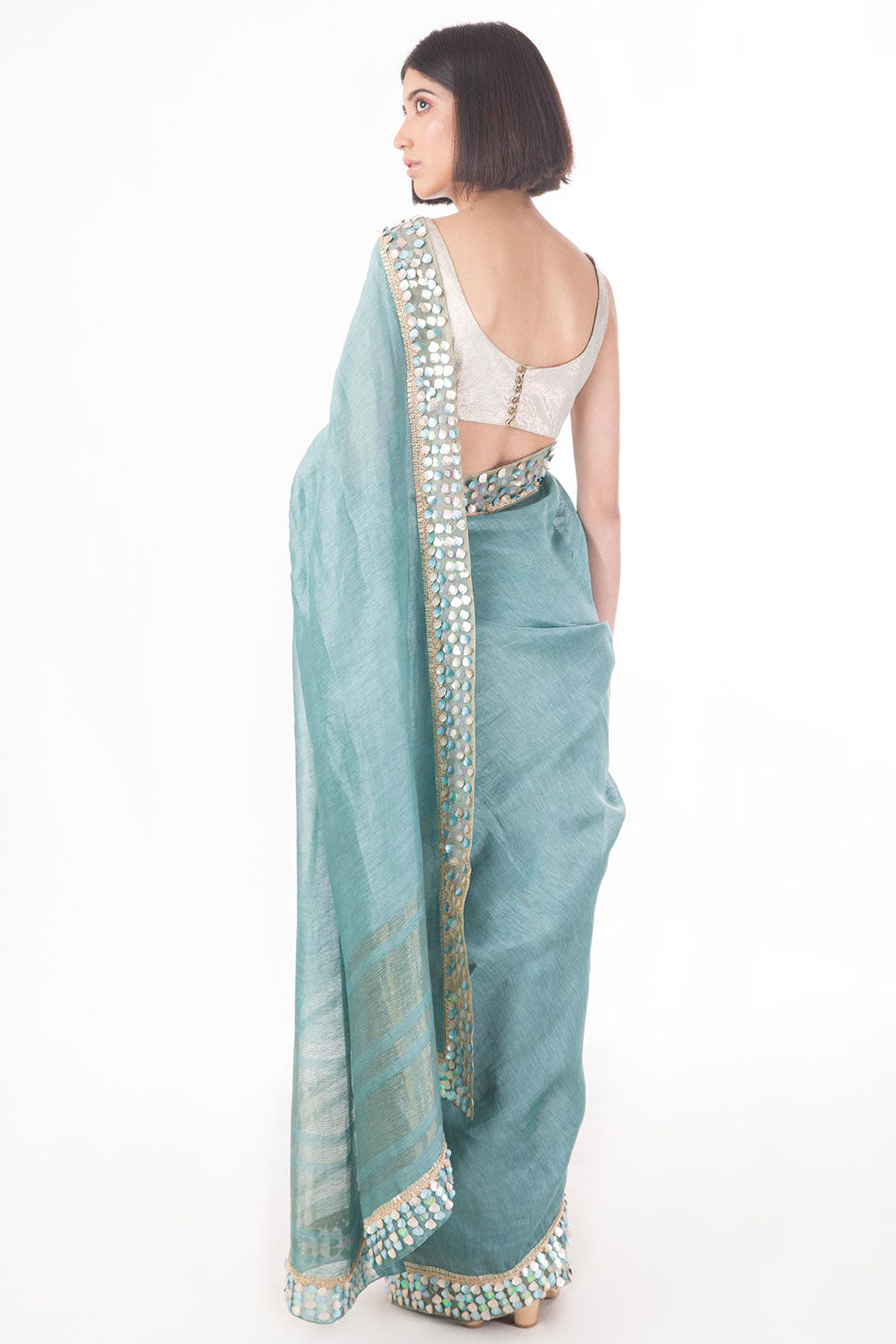 Teal Embroidered Linen Silk Saree