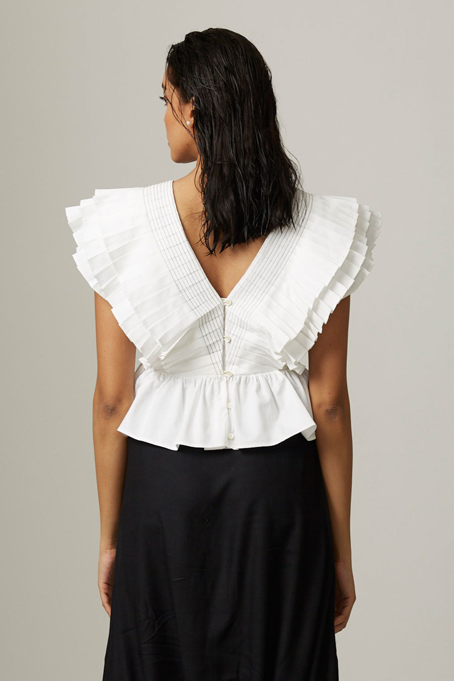 White Pleated Drama Peplum Top