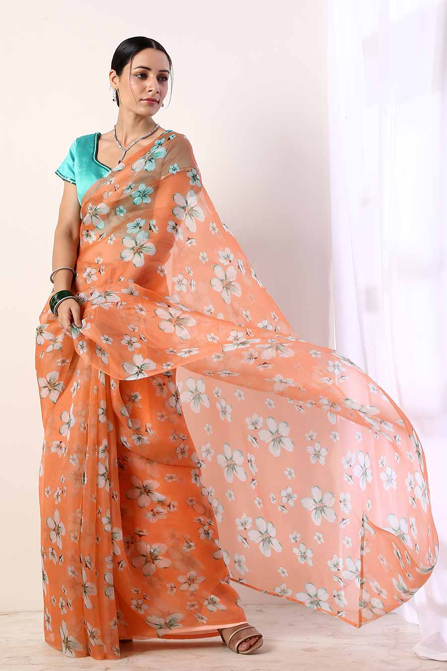 Coral Printed Organza Saree & Teal Blouse