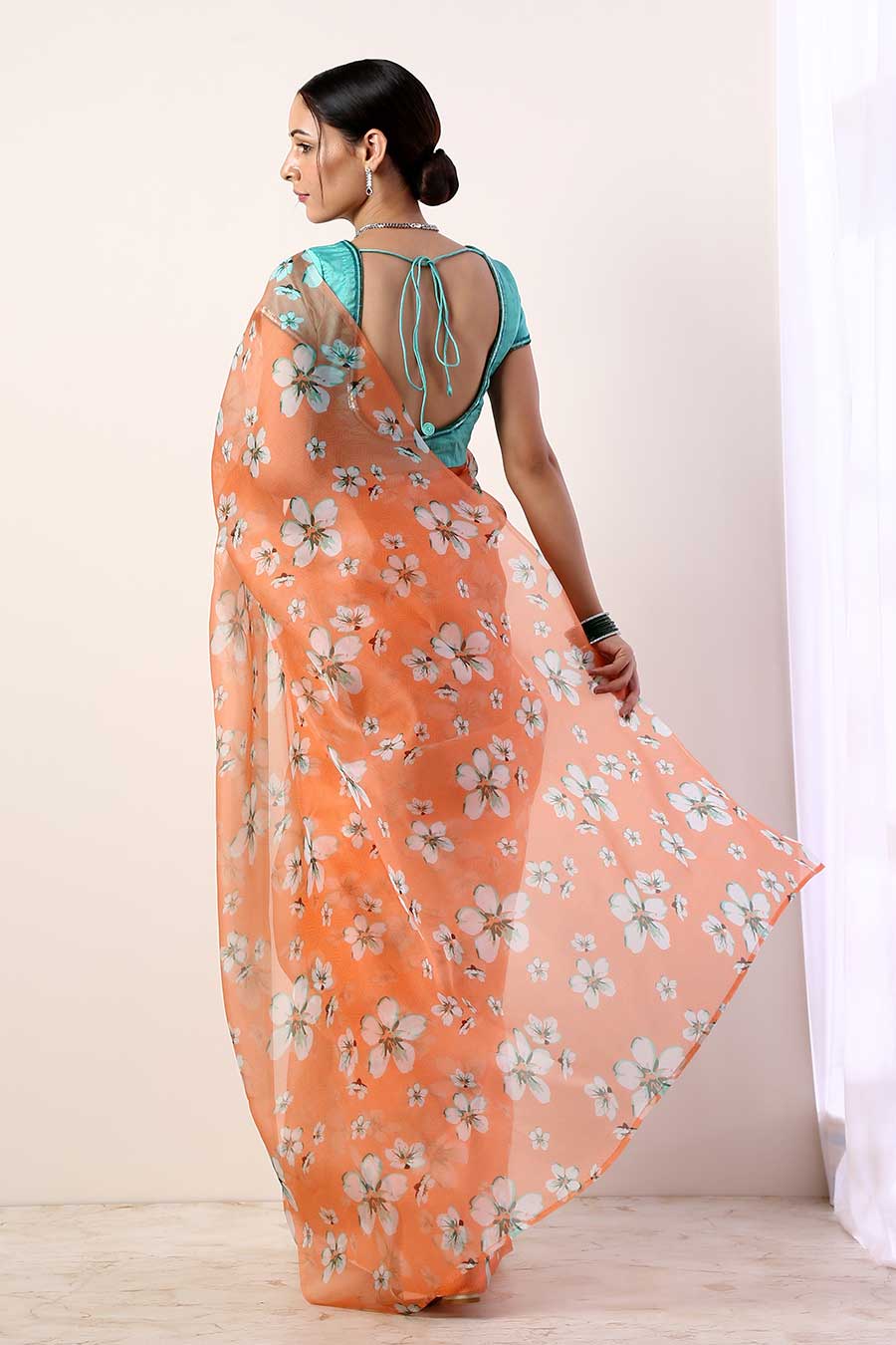 Coral Printed Organza Saree & Teal Blouse