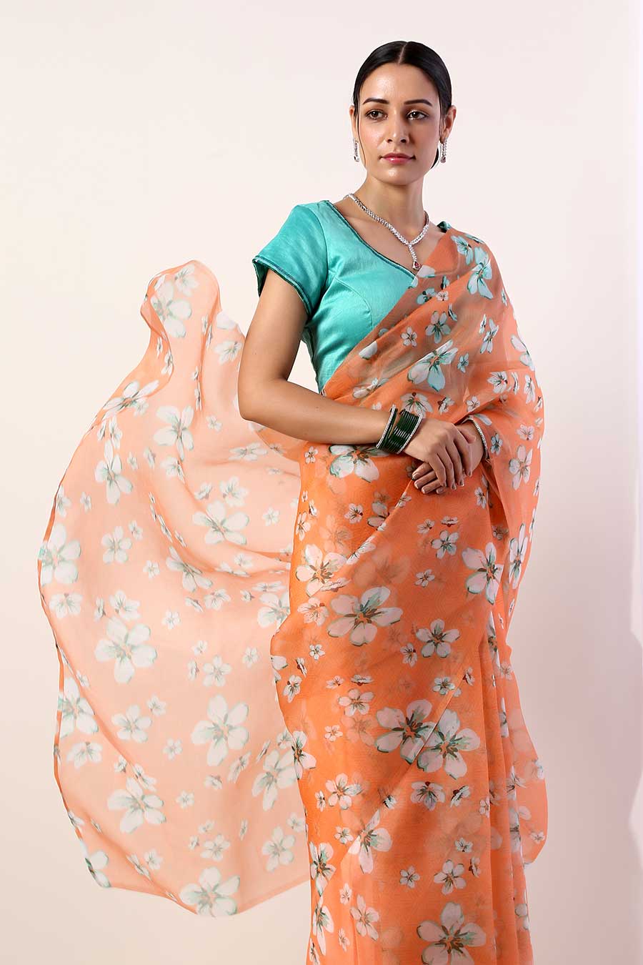 Coral Printed Organza Saree & Teal Blouse