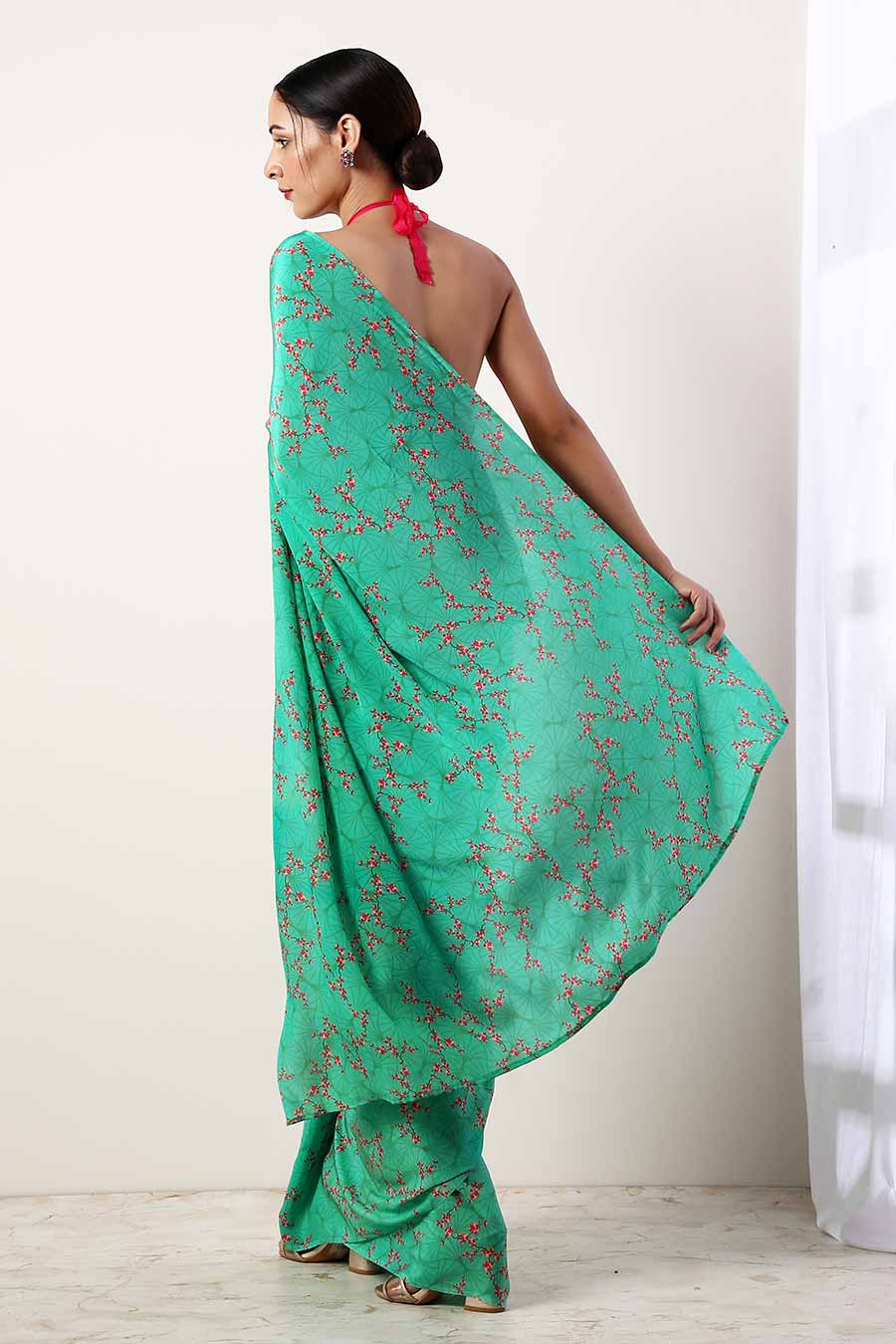 Green Crepe Saree & Unstitched Blouse