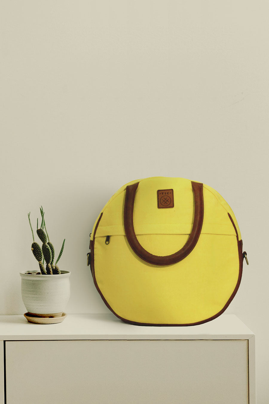 Kataan Round Yellow Handbag