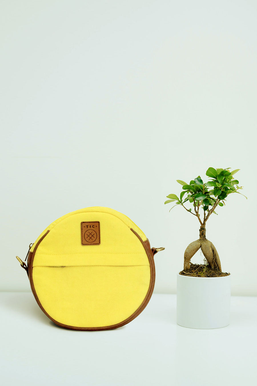 Kataan Round Yellow Sling Bag